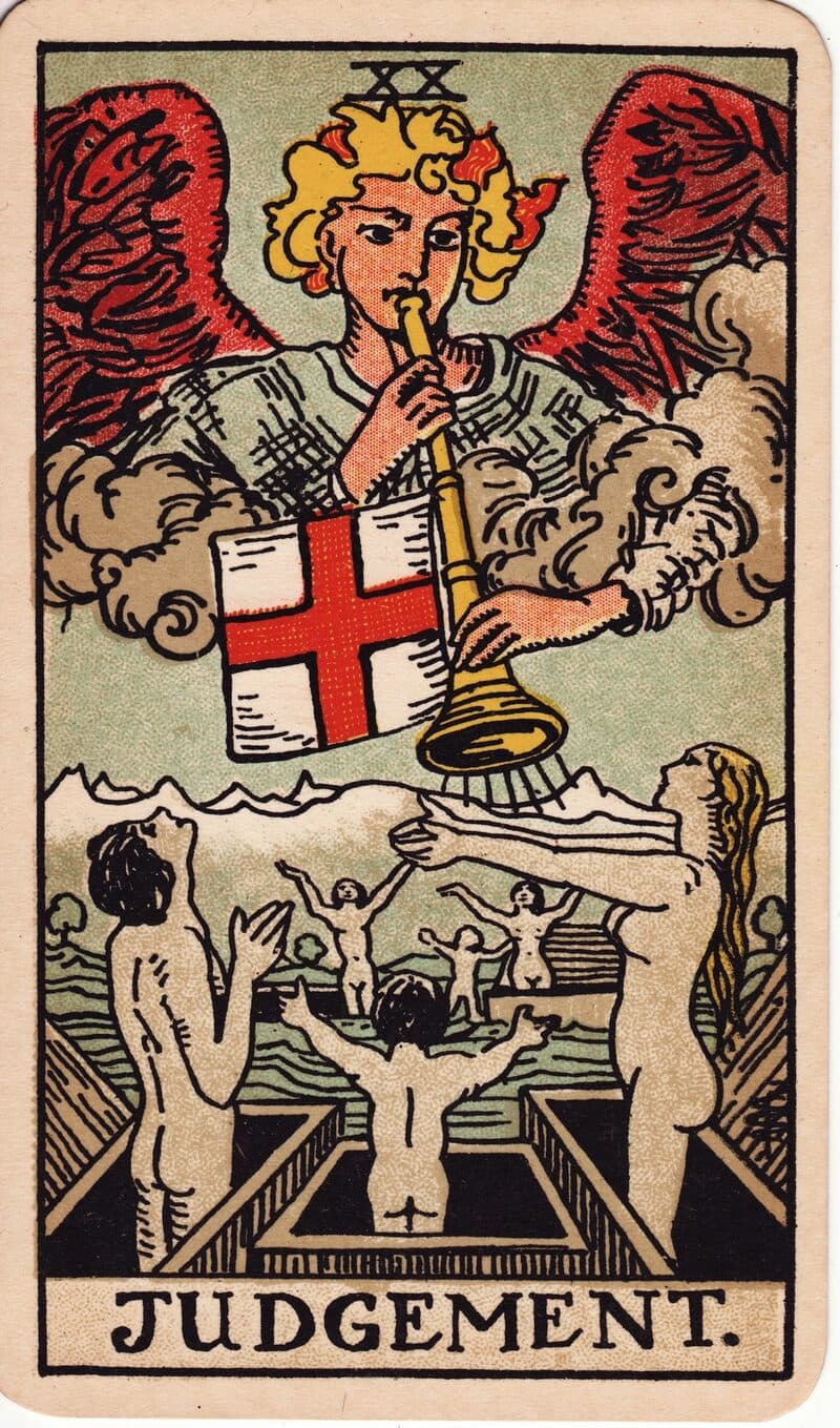 Carta de El Juicio — ángel haciendo sonar una trompeta sobre figuras que emergen de ataúdes, baraja Rider-Waite-Smith